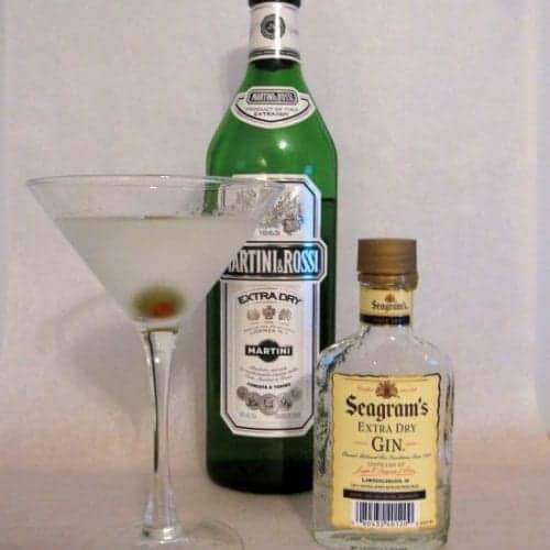 Gin Martini ingredients and a chilled martini glass.