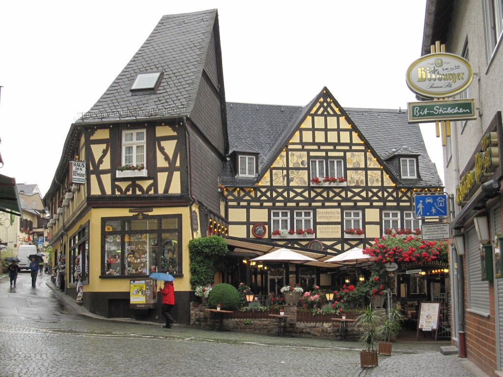 Exterior view of a restaurant in Rudesheim, Germany on a rainy day. 