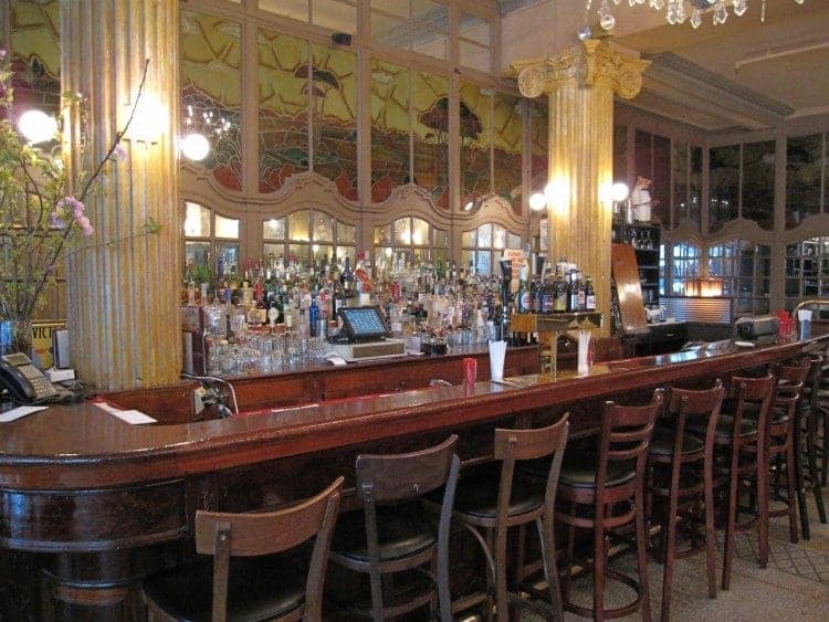 The original bar at Cafe Un Deux Trois in New York City