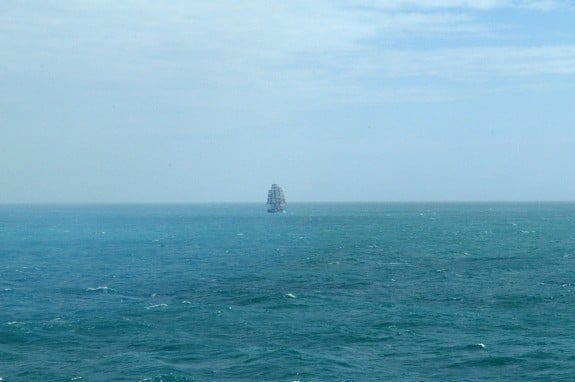 A four-masted ship appears out of nowhere.