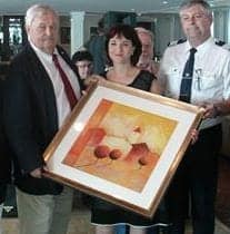 AmaWaterways artwork donation from the AmaDagio to Kiwanis International