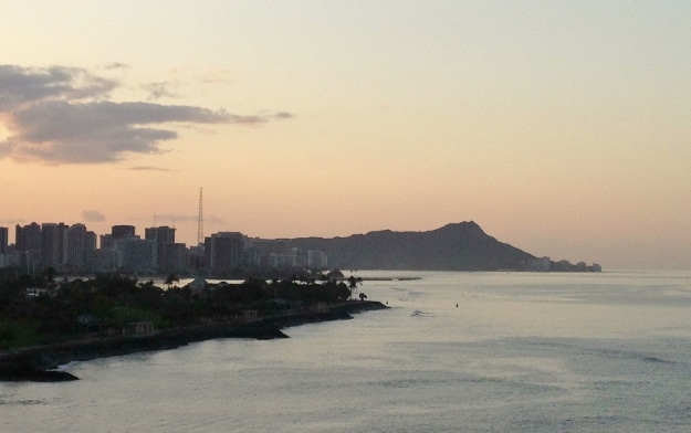 Golden Princess arrives in Honolulu at dawn with Diamond Head in the background