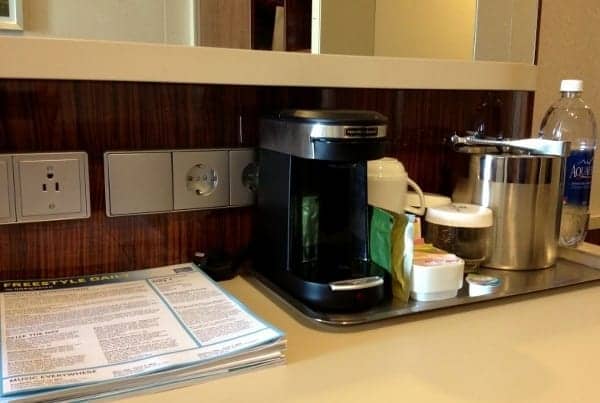A one-cup coffee/tea maker including real half & half and sugar is in every balcony and suite.