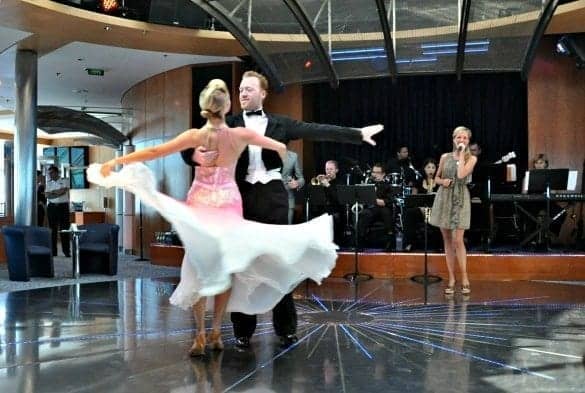 Ballroom dancers entertain at the past passenger cocktail party.