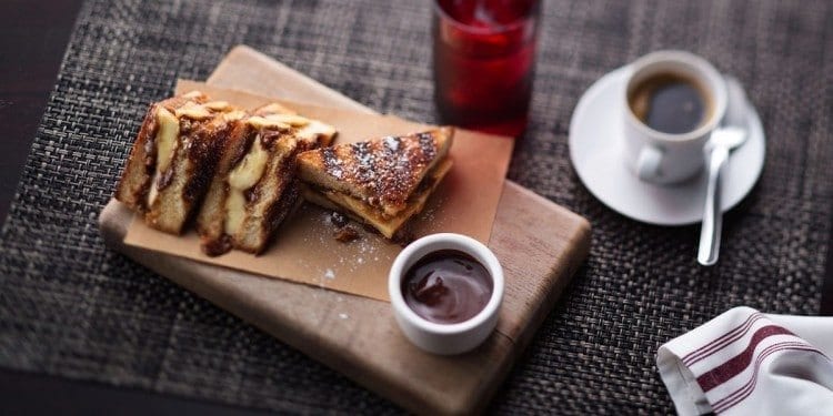 Looks like it's stuffed French Toast with a side of Nutella. Definitely not low-cal! Wait! It's a Banana-Toffee Panini! 