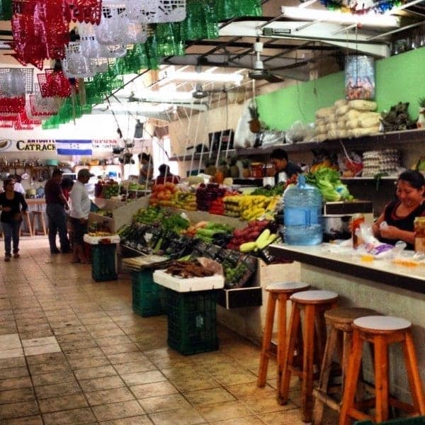 Fresh fish and meats to christening dresses and clay pottery at the Cozumel Mercado 