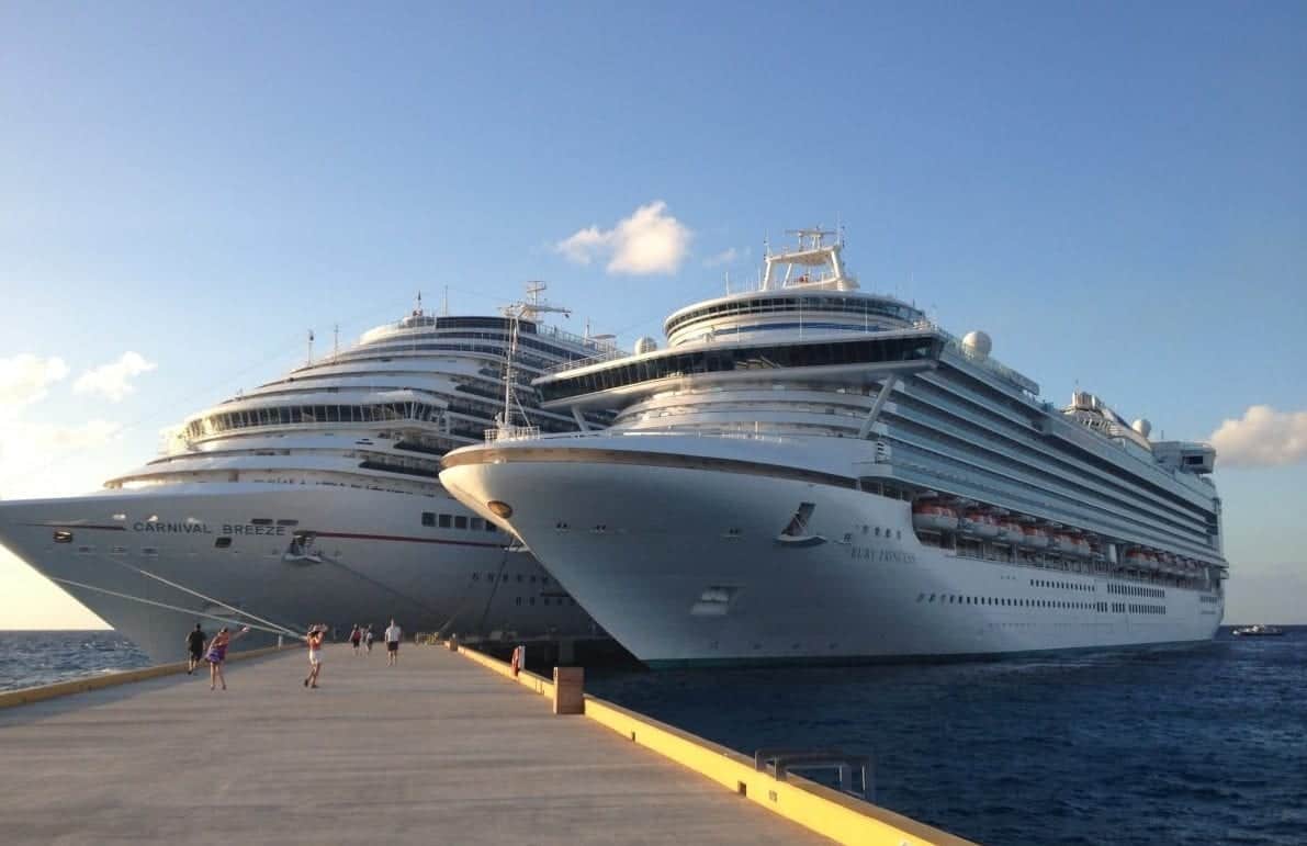 Cruise Lines cancel all cruises until mid-September. Carnival and Princess ships in Cozumel