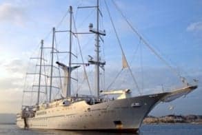 First time cruisers will love it as the Windstar Wind Spirit is about to raise the anchor to depart the port of Cannes.