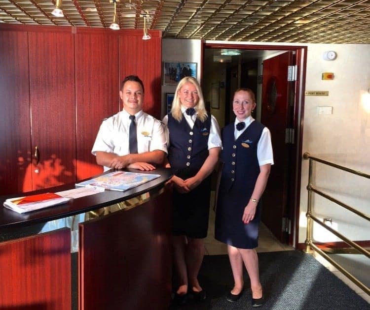 A warm Italian welcome aboard from the Reception staff and our cruise manager.