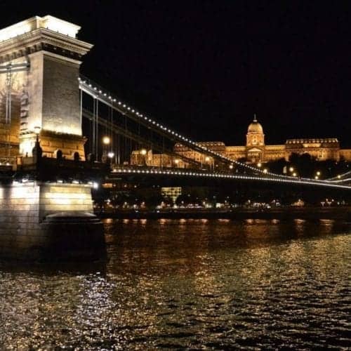Places to Visit in Budapest include the Chain Bridge at night