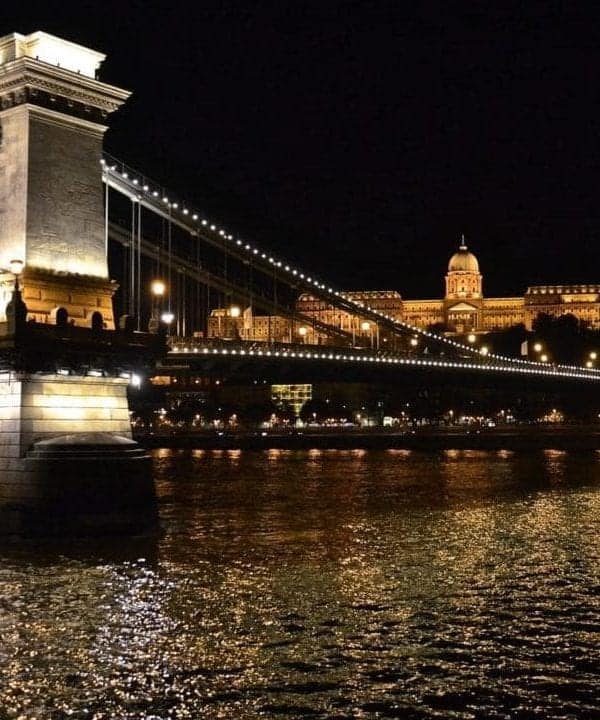 Places to Visit in Budapest include the Chain Bridge at night