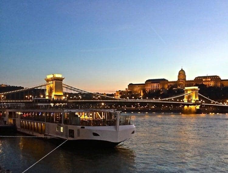 Sunset behind the Buda Castle as the Viking Lif is docked for the night at the Chain Bridge.