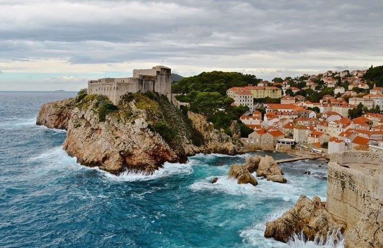 Waves crash against the rocks of the fortress Lovrijenac, built in 1018, in Dubrovnik, Croatia.