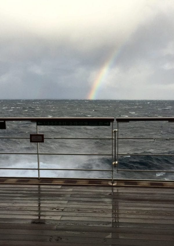 Rainbow and rough seas on the North Atlantic. Prevent getting seasick.