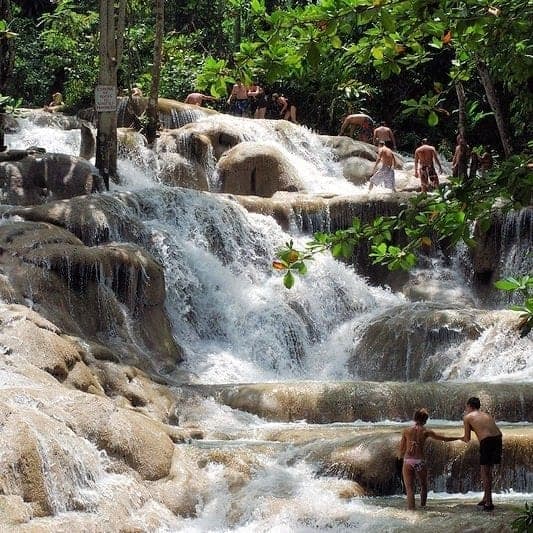 Climbing Dunn's River Falls, close to Ocho Rios, Jamaica