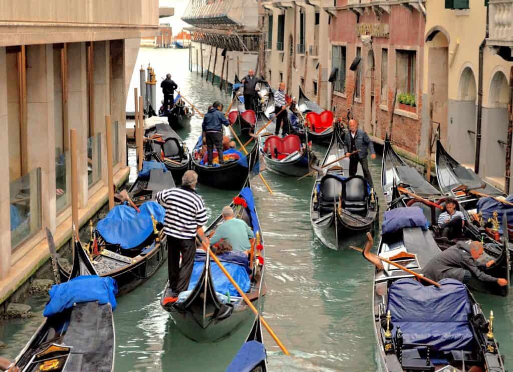 Venice gondolas on a canal.