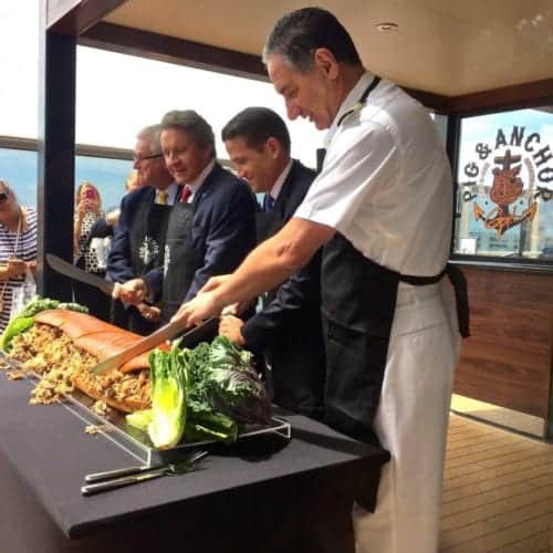 Carnival Magic Captain Anthony Marchetti leads the 6-foot long pulled pork sandwich-cutting ceremony!