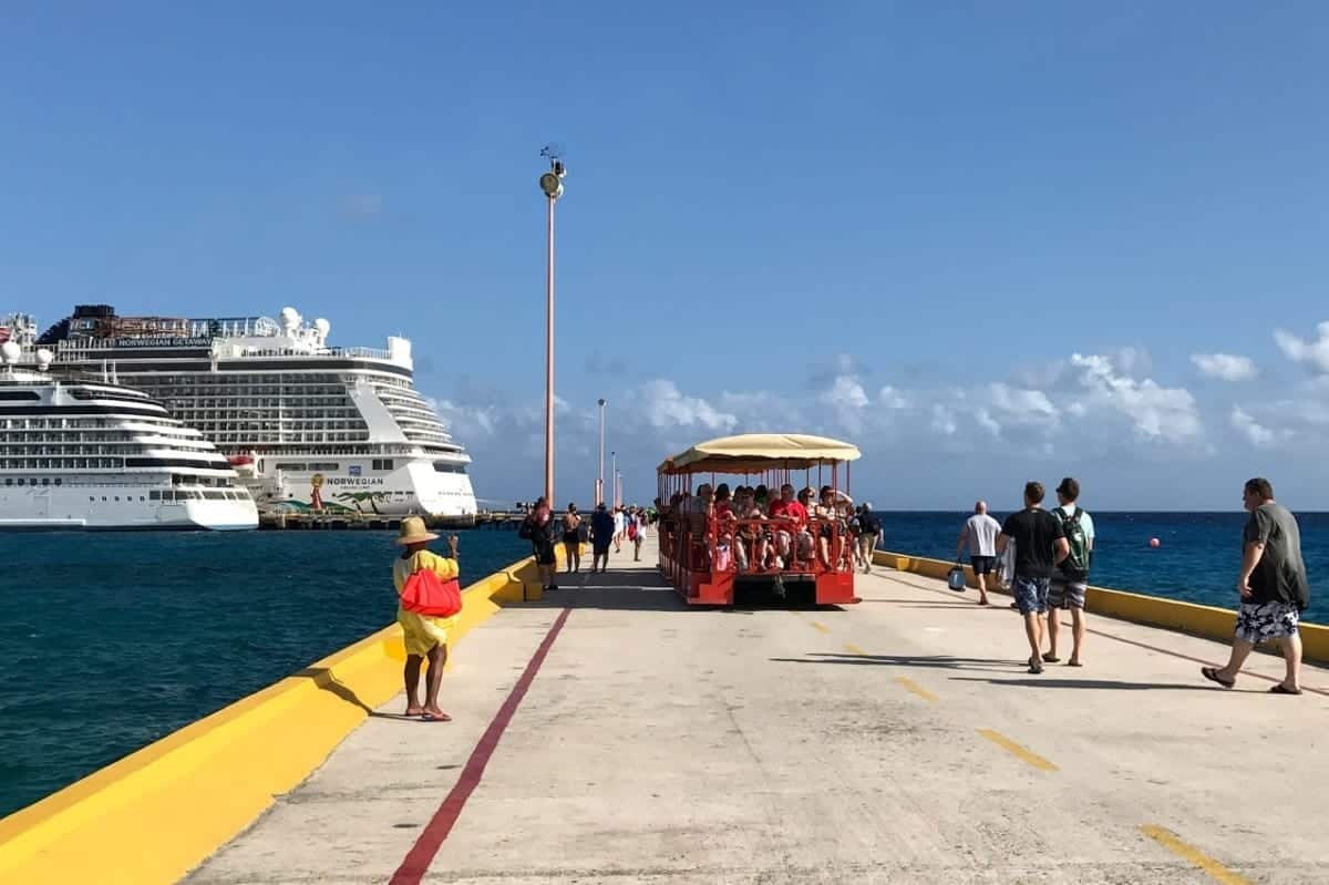 People on board the free trolley at Costa Maya port back to the ship.