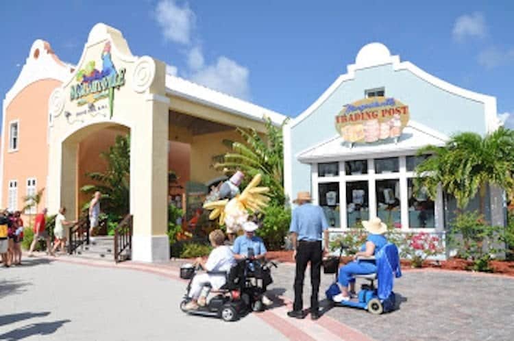 Cruise guests in wheelchairs at cruise port.