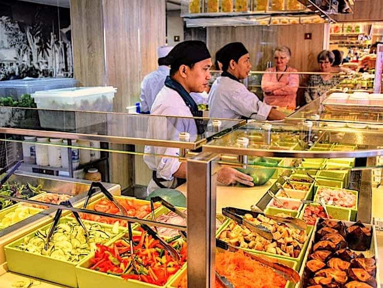 New York Deli & Pizza. Lido Buffet serving utensils turned backwards for sanitary safety.