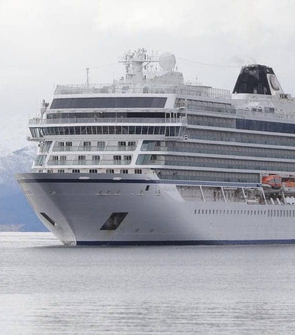Viking Sky and tugboats arrive in Molde, Norway