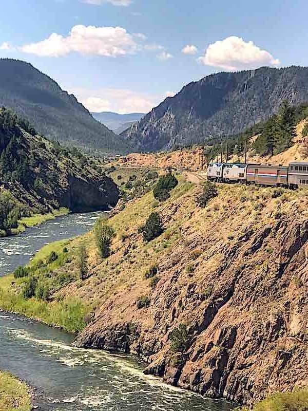 Amtrak California Zephyr rounding a turn along the Colorado river.