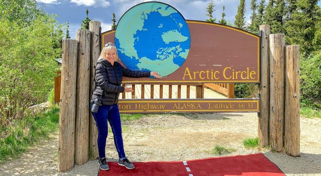On a solo cruise to Alaska, I took a shore tour to this welcome to the Arctic Circle sign. 