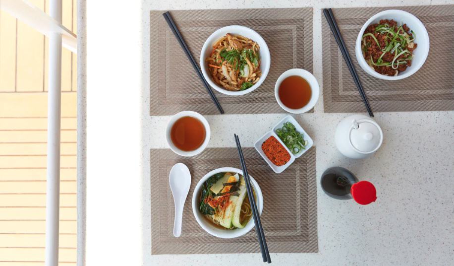 Majestic Princess Chopsticks Noodle Bar aerial view of bowls of soup.