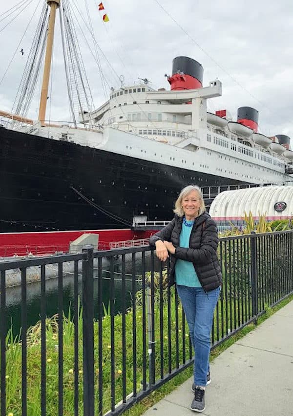 Sherry standing in front of Queen Mary in Long Beach.