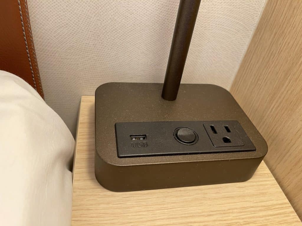 Wonder of the Seas Stateroom Nightstand with USB and electric plug. 