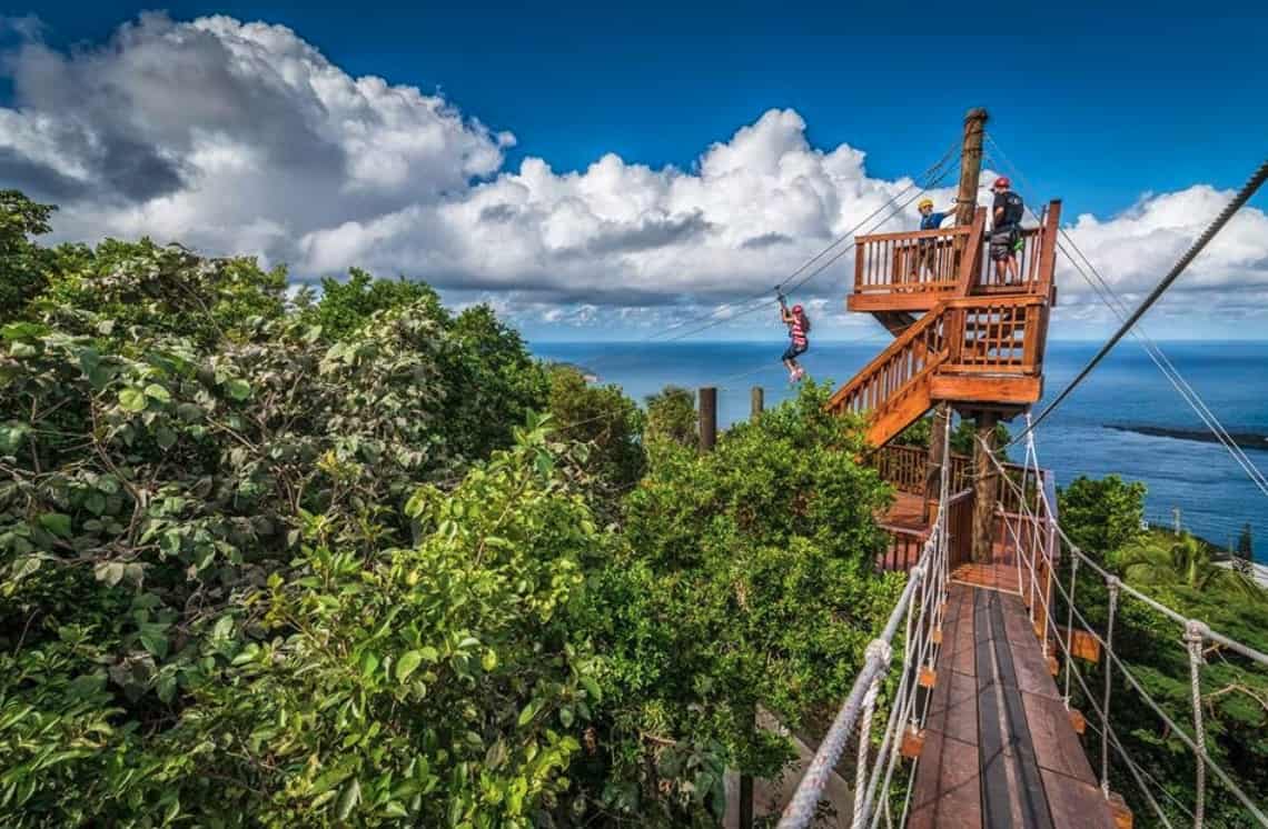 Tree Limin extreme zipline in St. Thomas with people on the top platform.