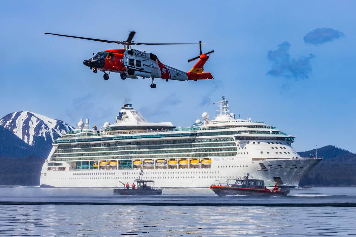 Royal Caribbean's Brilliance of the Seas with a U.S. Coast Guard helicopter. Photo Source: U.S. Coast Guard Alaska