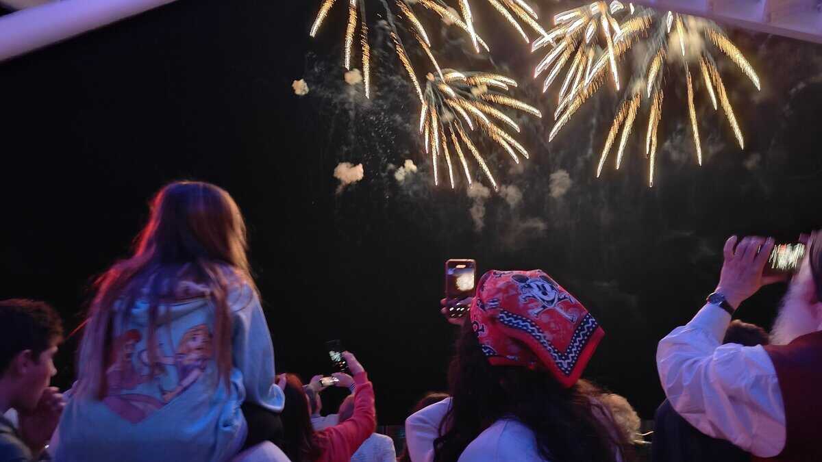 Fireworks light up the sky during Pirate Night on Disney Wish
