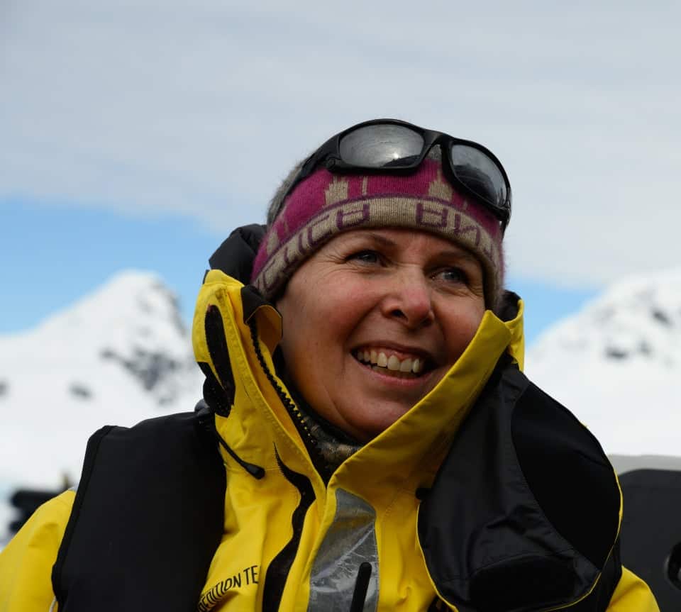 Karin Strand, VP of Expedition Development at HX Expeditions, smiling in outdoor expedition gear